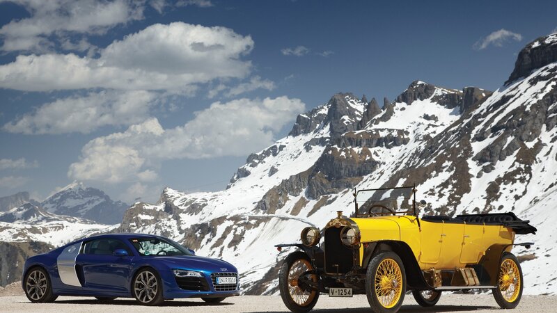 Classic and modern cars in mountains