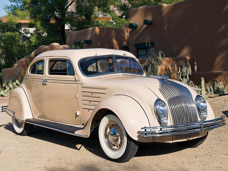 Classic beige car in desert setting