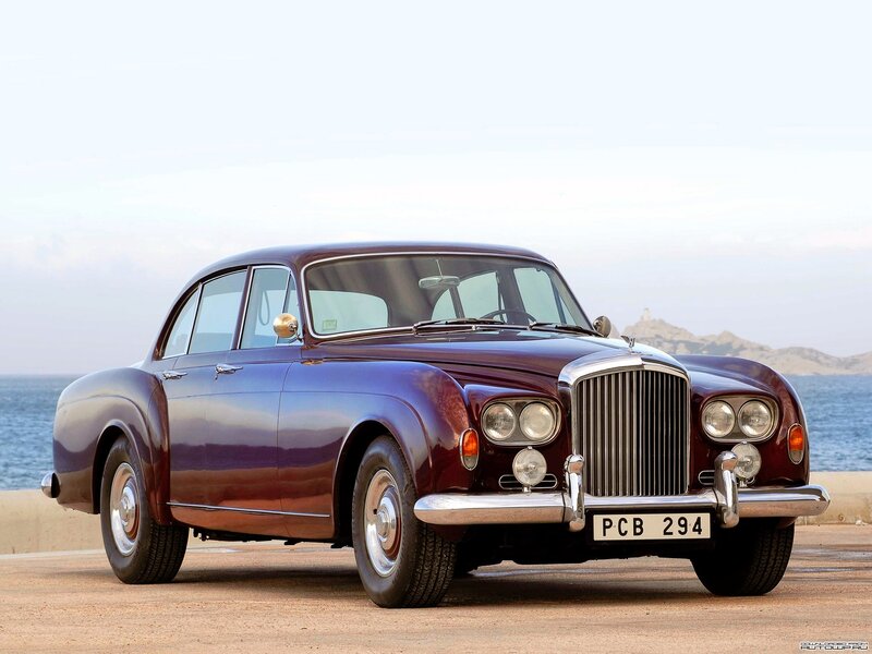 Classic Bentley parked by the sea