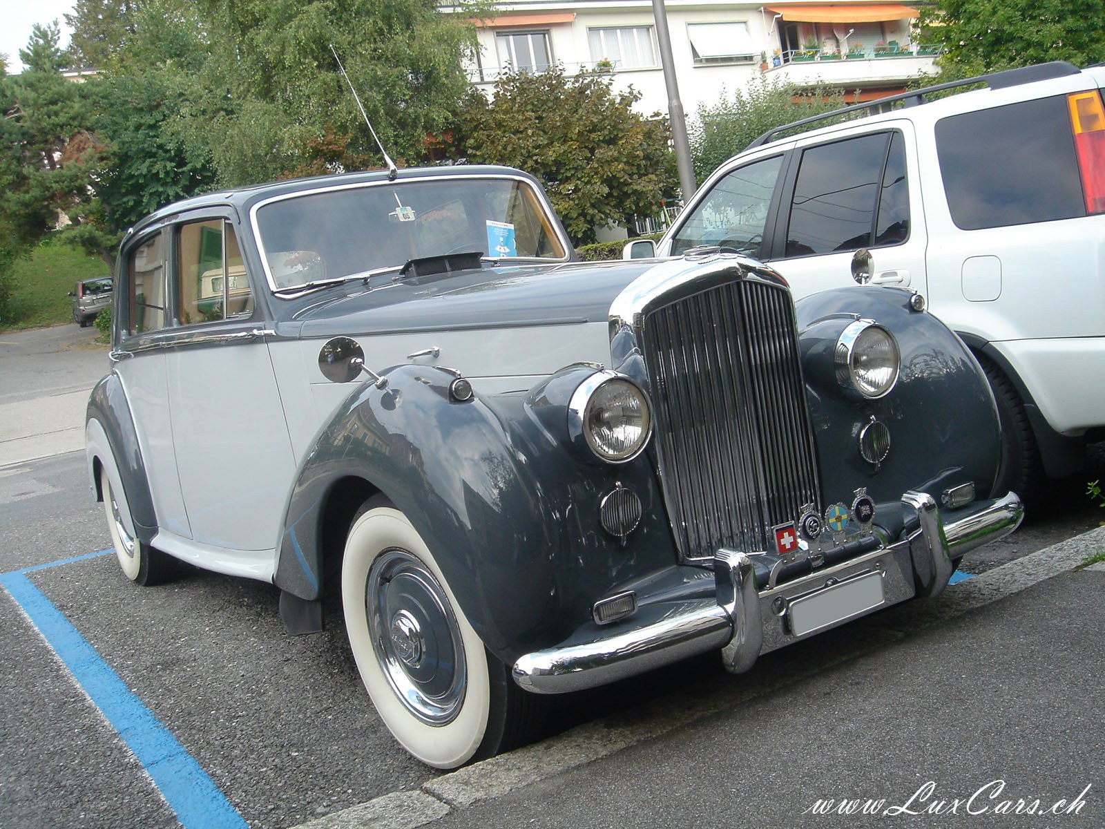 Classic Bentley parked in lot