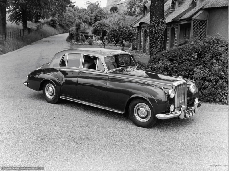 Classic Bentley parked on a road