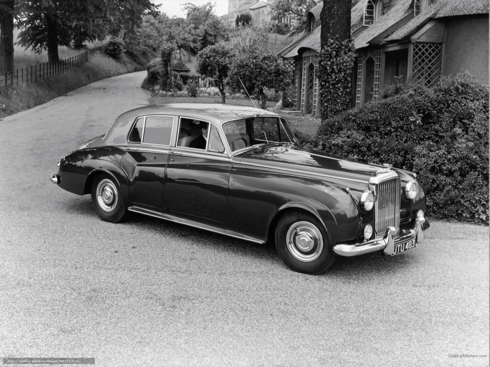 Classic Bentley parked on a road