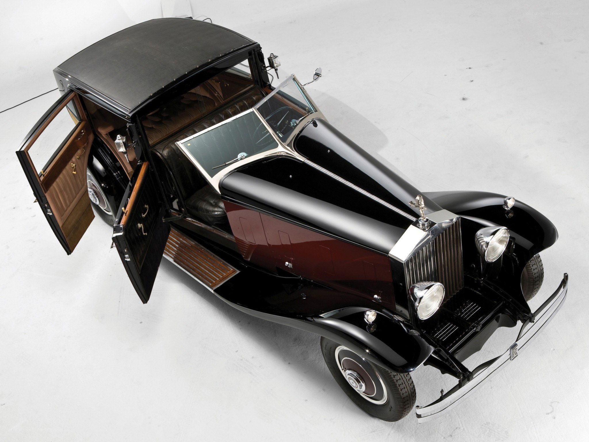 Classic black and maroon Rolls-Royce