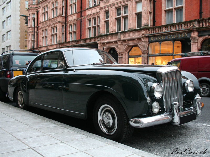 Classic black Bentley on city street
