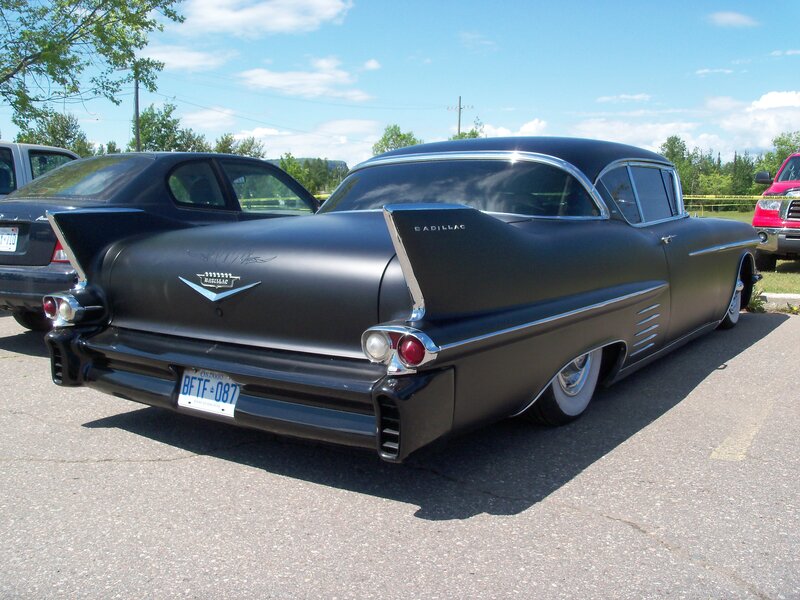 Classic black Cadillac at car show