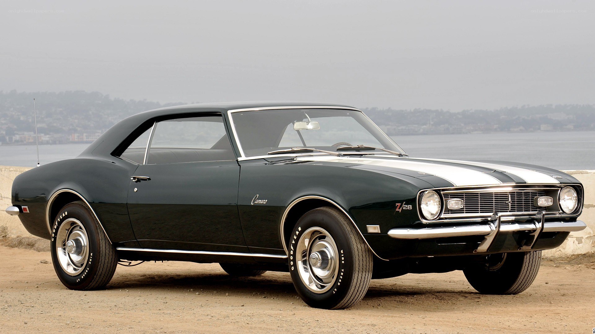 Classic black Camaro with stripes