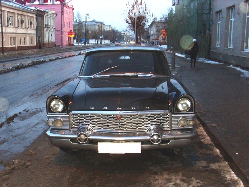 Classic black car on a city street