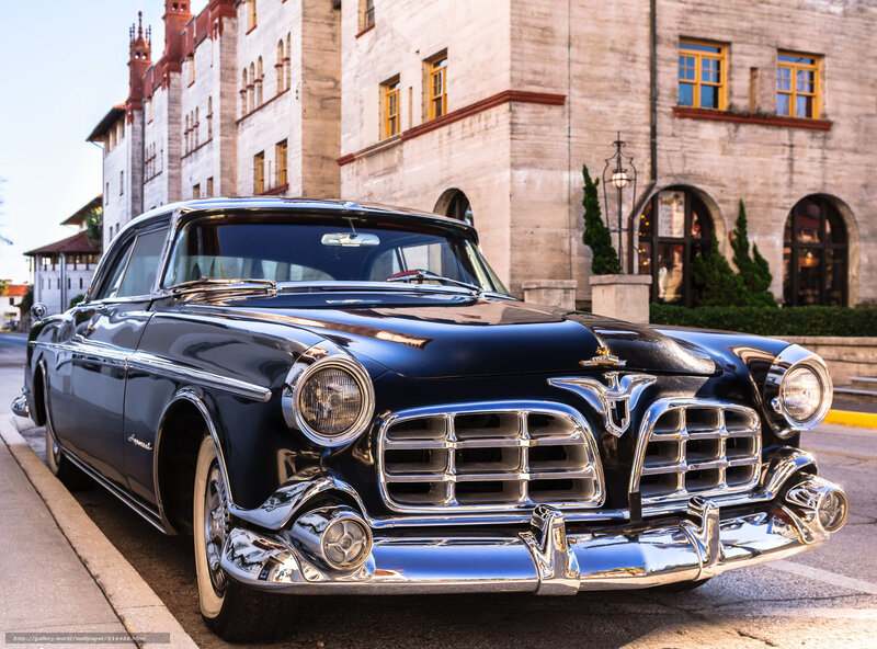 Classic black car on city street
