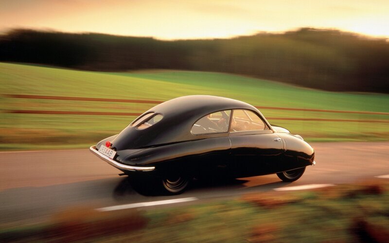 classic black car on country road