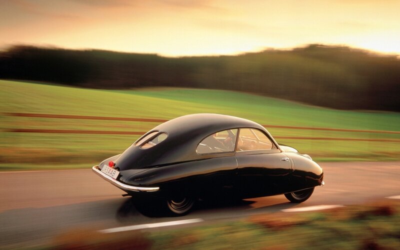 classic black car on country road