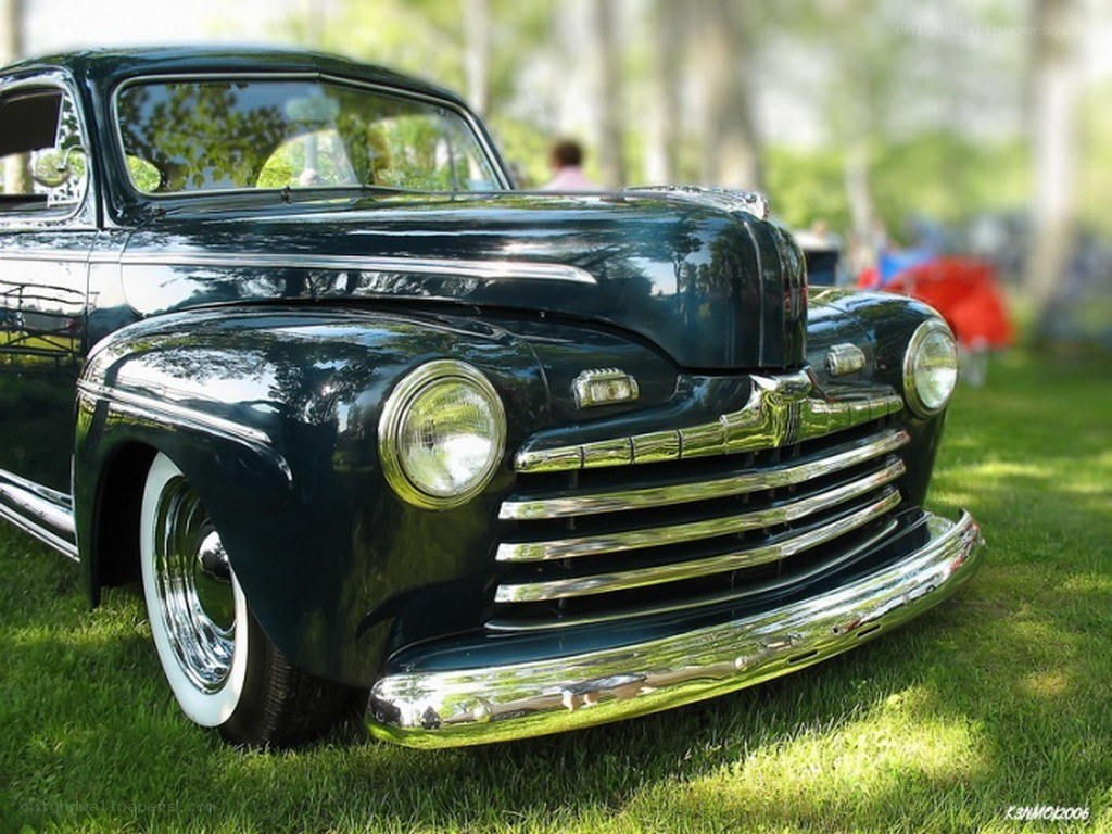 classic black car on grass