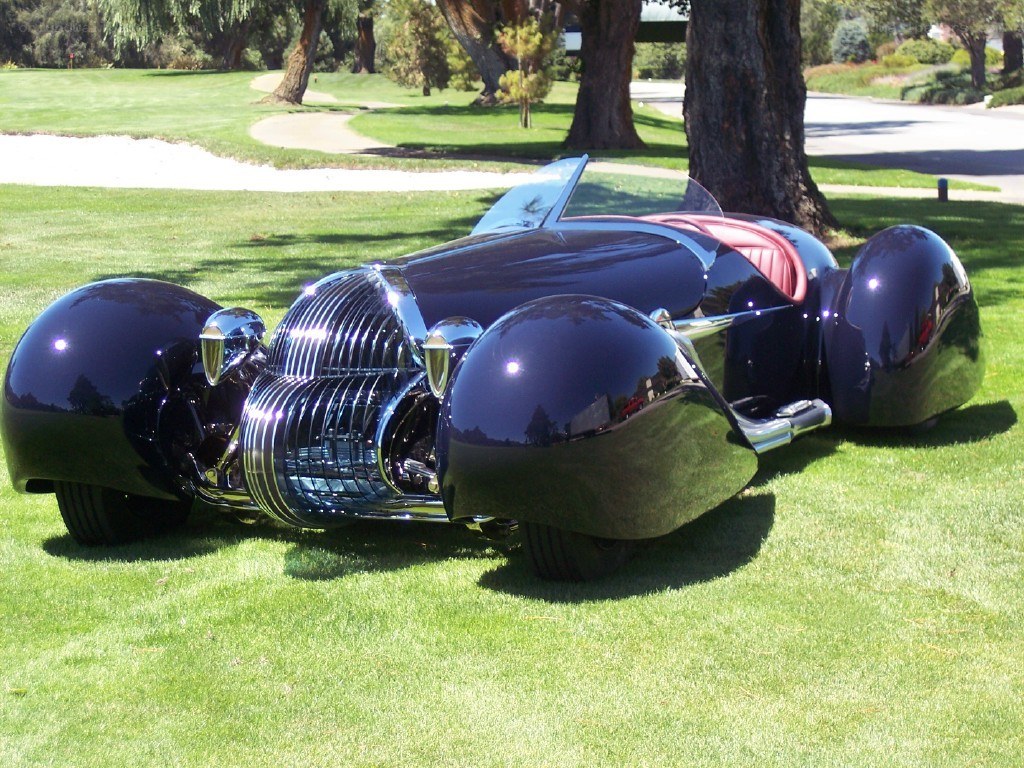 Classic black car on grass