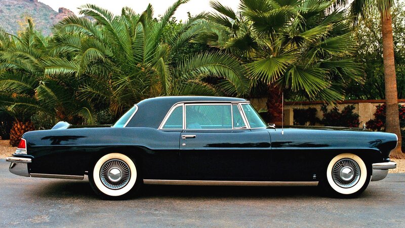 Classic black car with white-walled tires