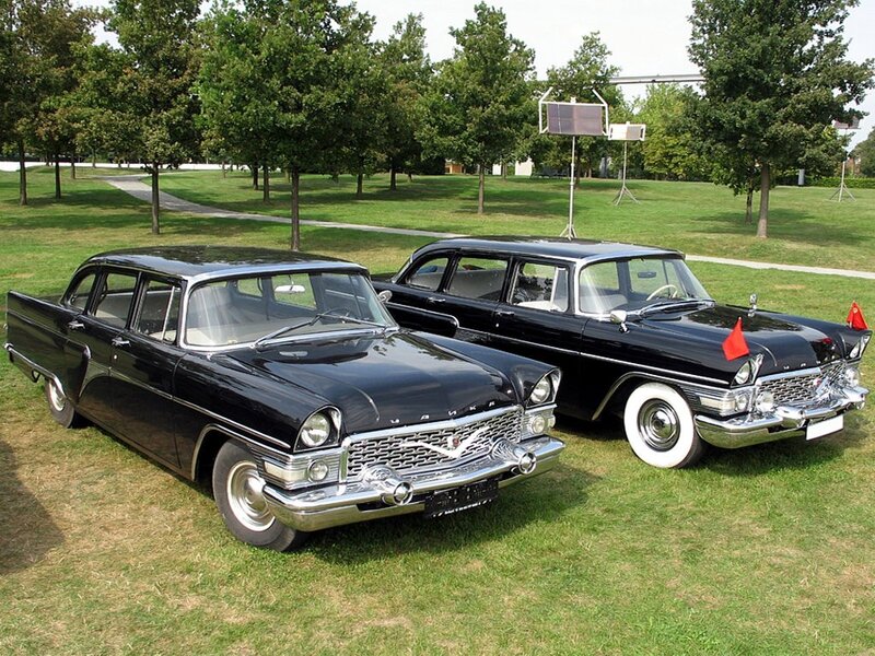 Classic black cars on grass