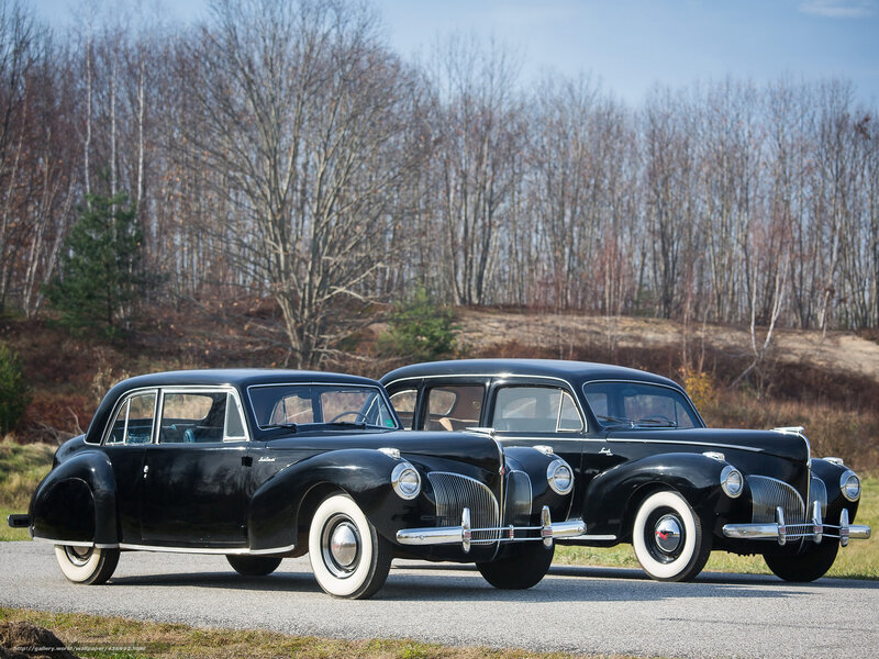 Classic black cars on road