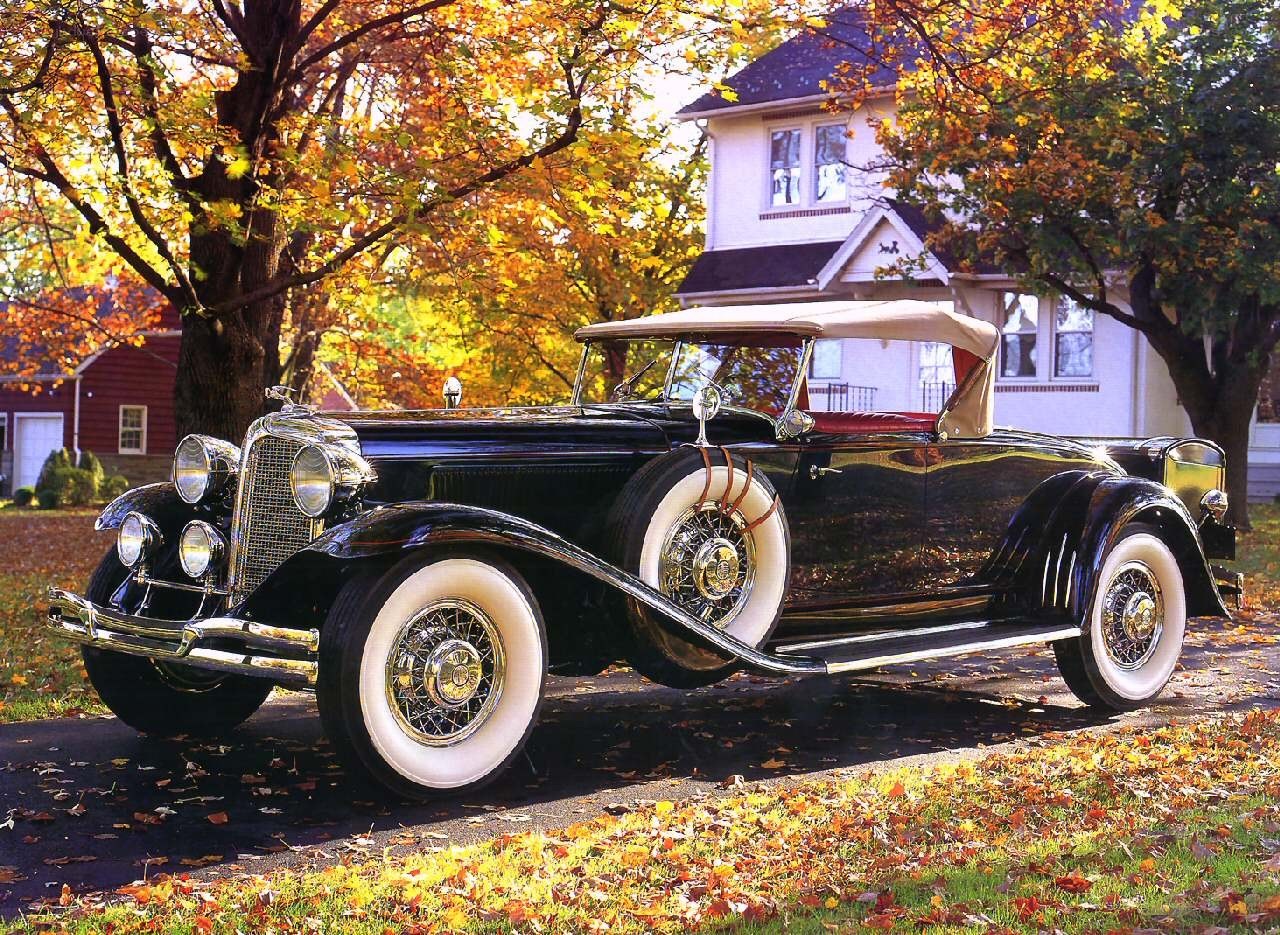 Classic black convertible in autumn