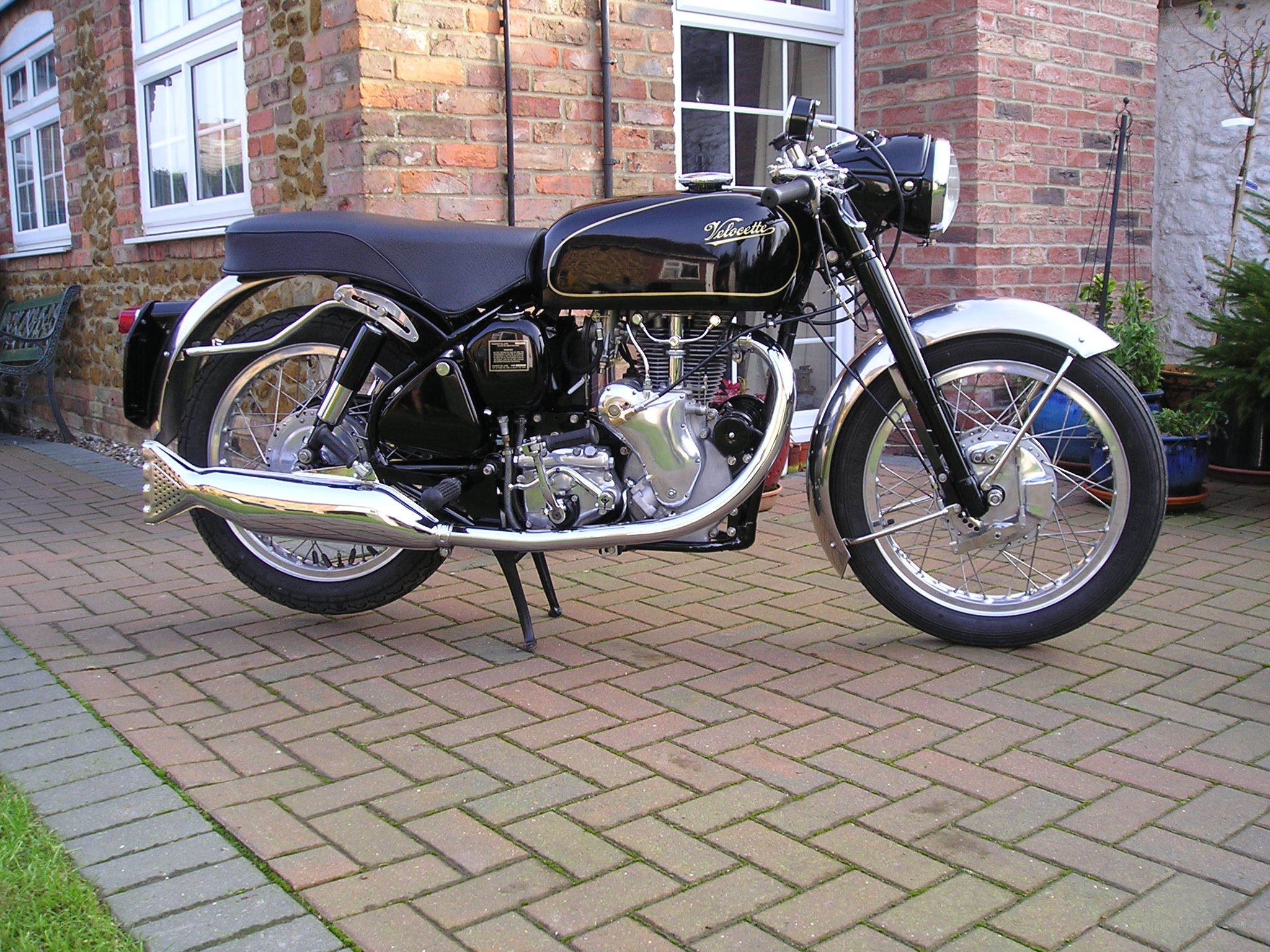 Classic black motorcycle on patio