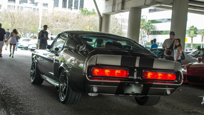 classic black muscle car at show