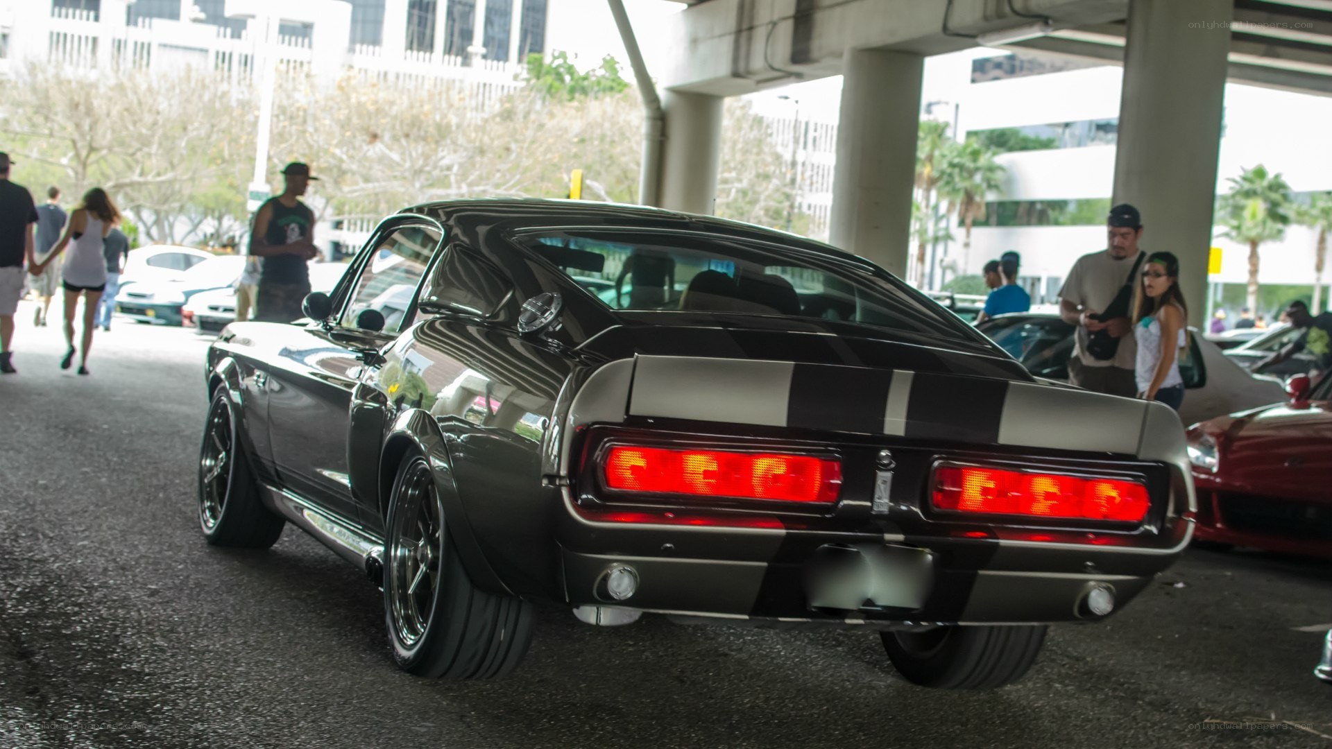 classic black muscle car at show