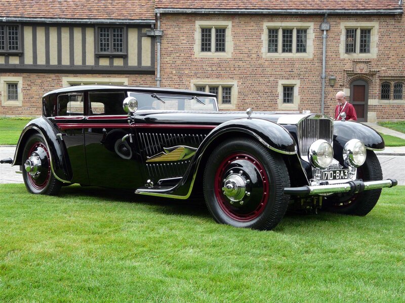 Classic black vintage car on lawn