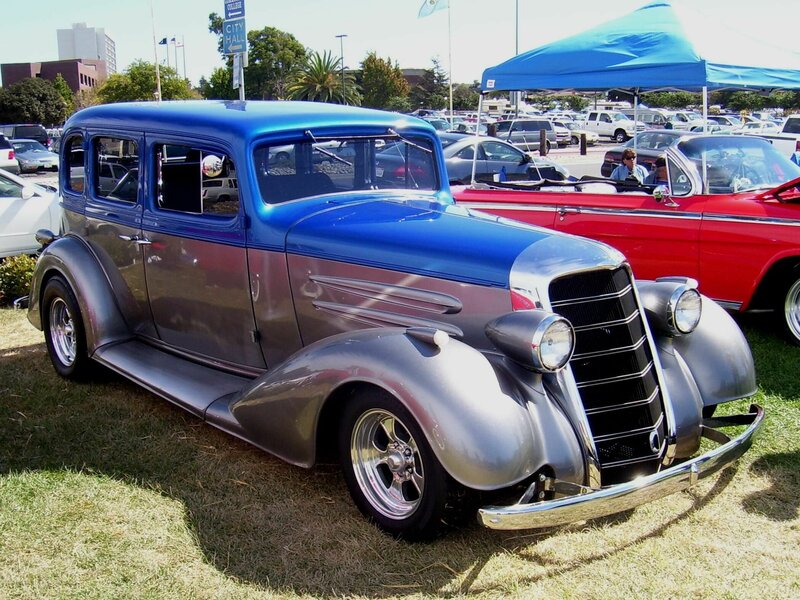 Classic blue and gray car at show