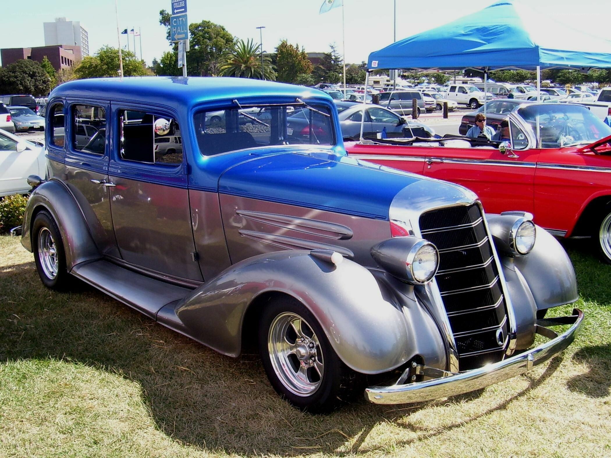Classic blue and gray car at show
