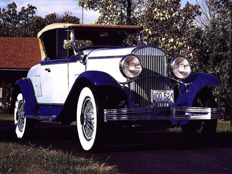 Classic blue and white convertible car