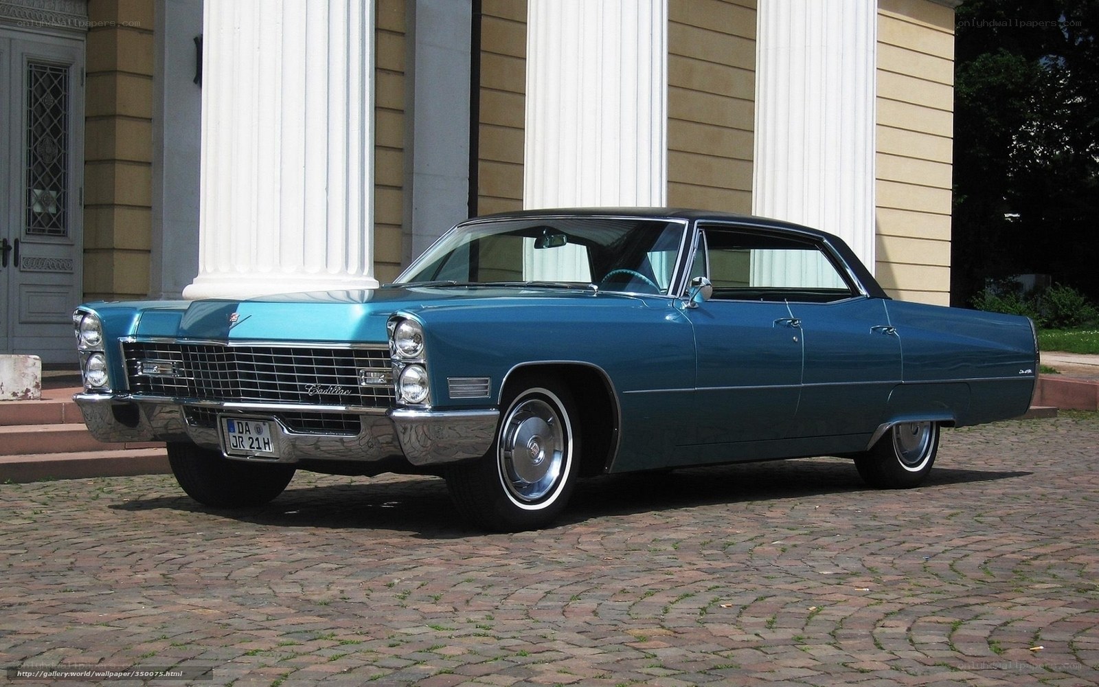 Classic blue Cadillac parked