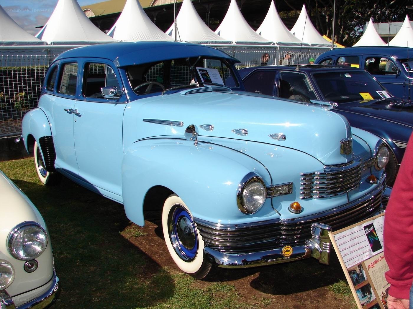 Classic blue car at a show