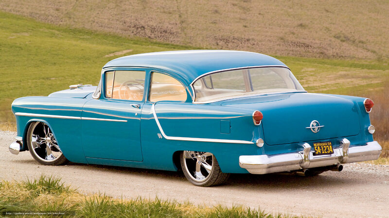 Classic blue car on a rural road