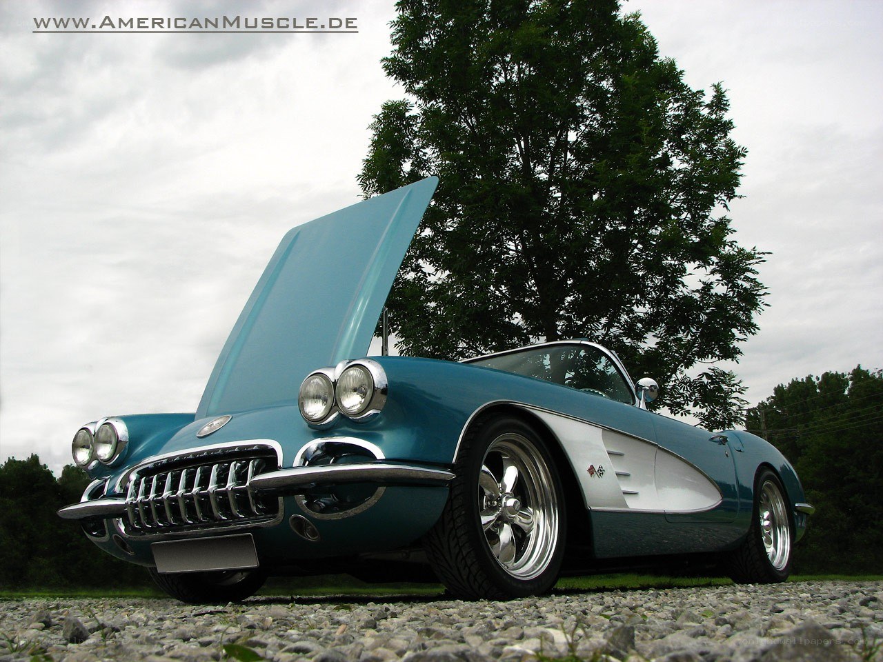 Classic blue Corvette with open hood