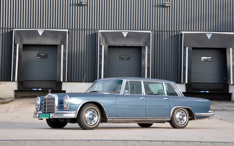 Classic blue Mercedes-Benz sedan