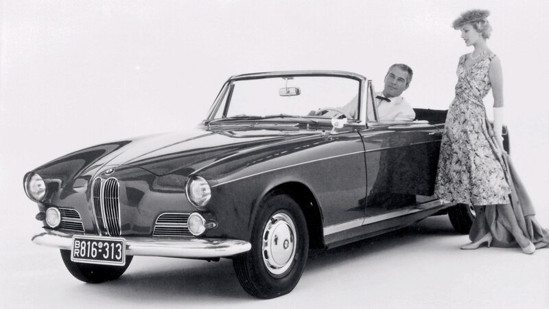 Classic BMW convertible with couple
