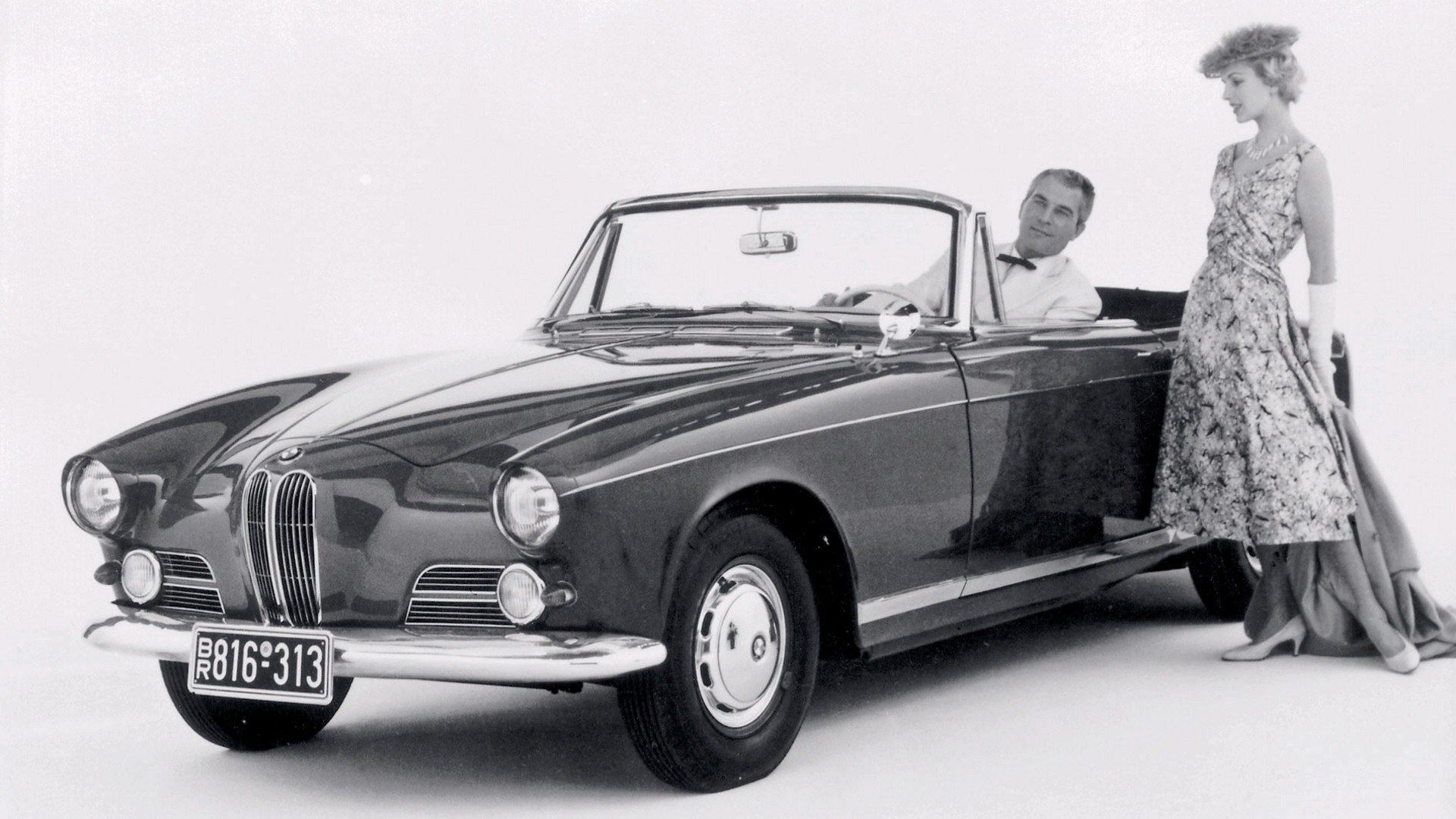 Classic BMW convertible with couple