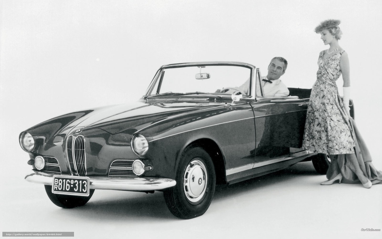 Classic BMW convertible with couple