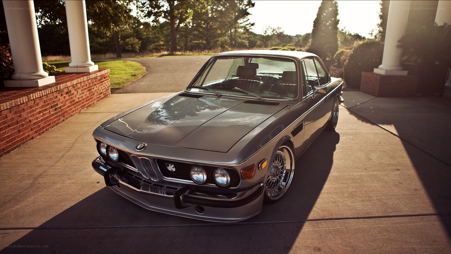 Classic BMW in driveway