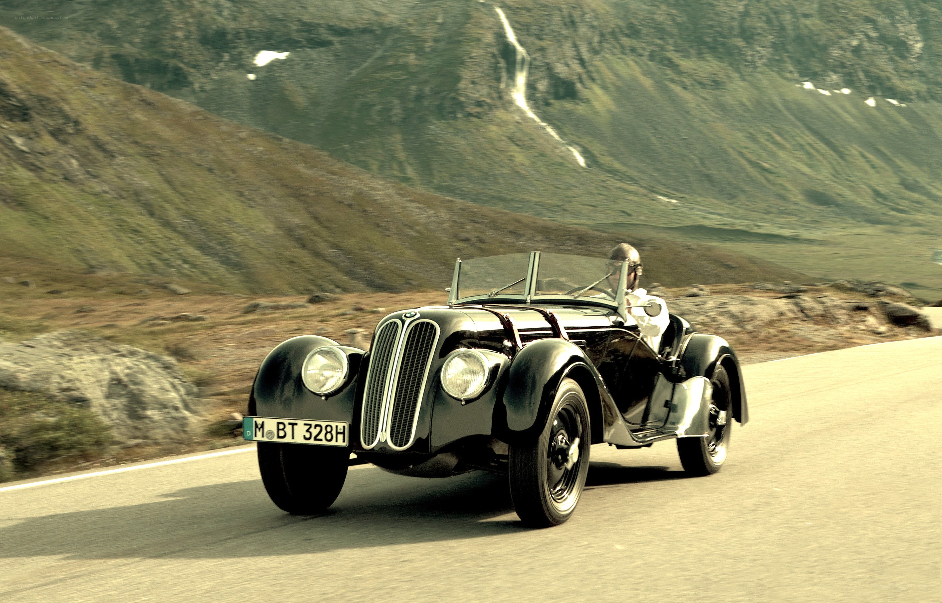Classic BMW on a mountain road
