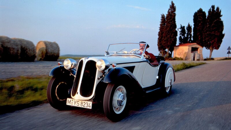 Classic BMW roadster on country road