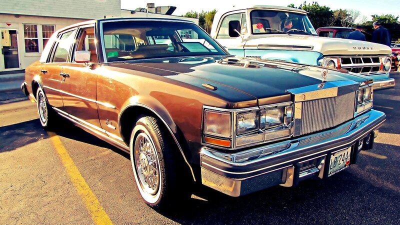 Classic brown sedan at car show