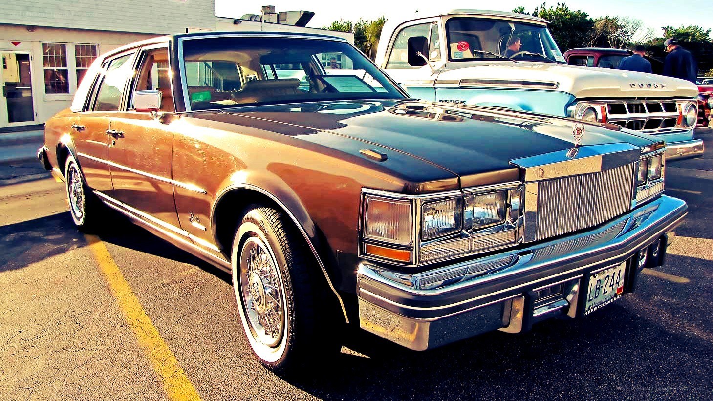 Classic brown sedan at car show