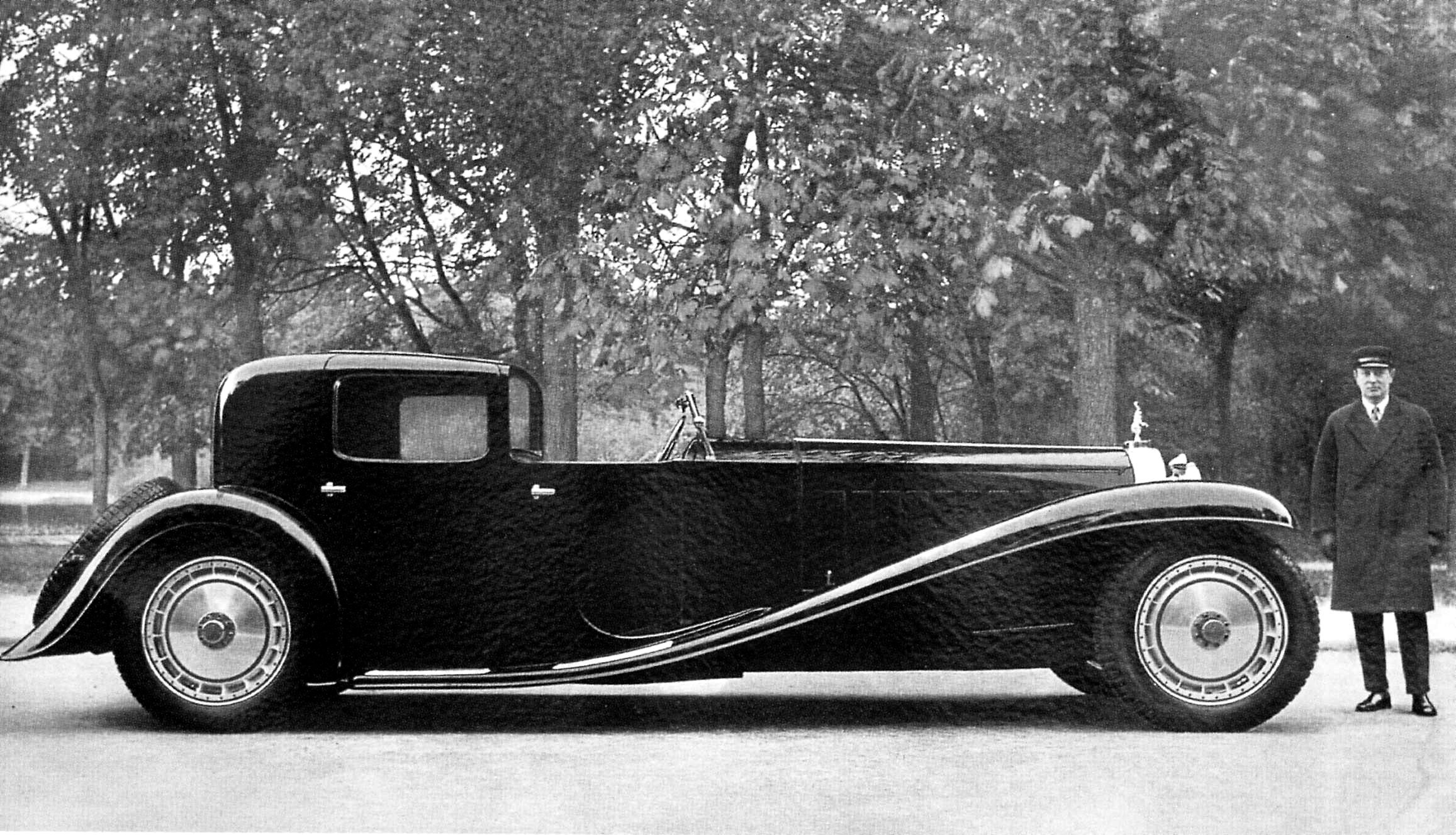 Classic Bugatti car with man