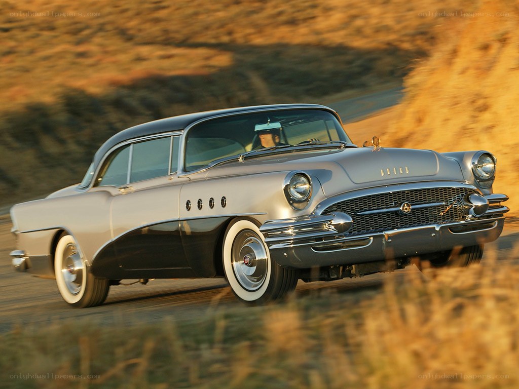 Classic Buick driving on a road