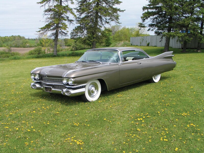 Classic Cadillac on a grassy field