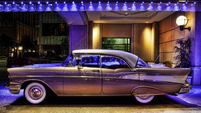Classic Car at Hotel Entrance — Purple