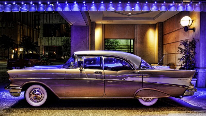 Classic car at hotel entrance