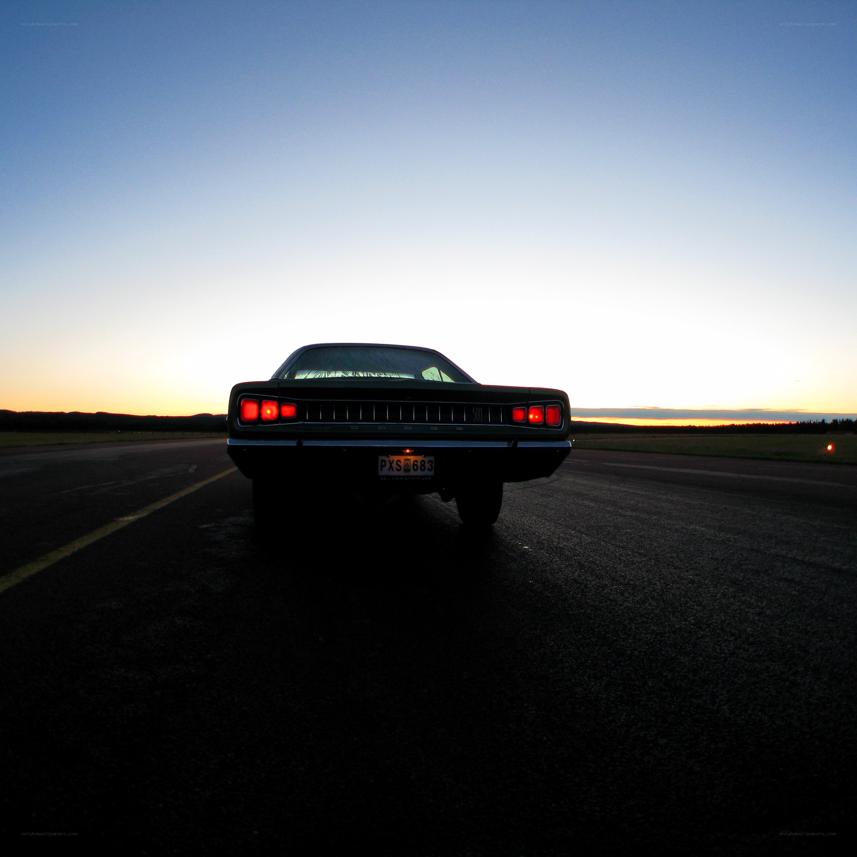 Classic car at sunset