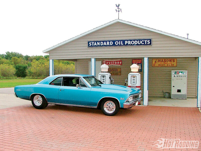 Classic car at vintage gas station