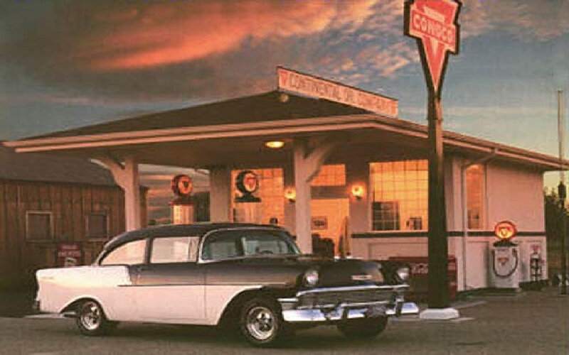Classic car at vintage gas station