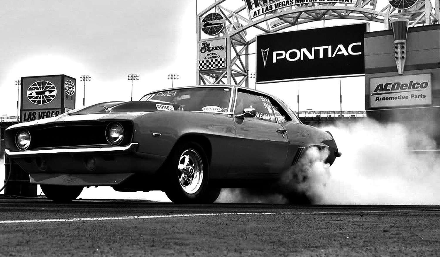 classic car burnout at drag strip