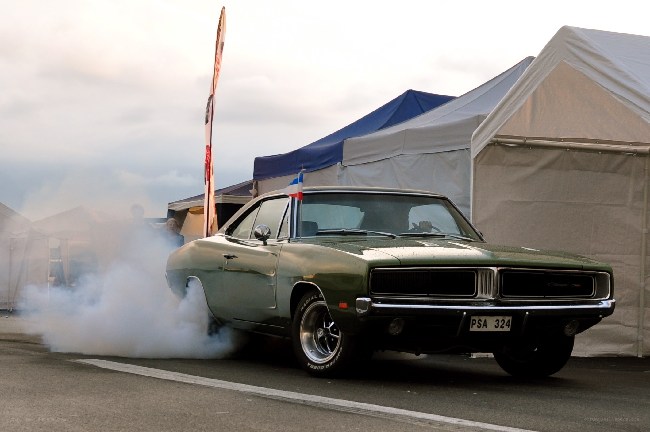 Classic car burnout at event